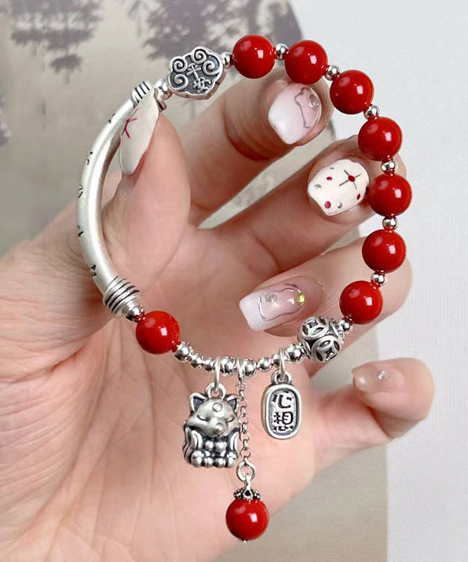 Mulberry Sterling Silver Cinnabar Tassel Charm Bracelet