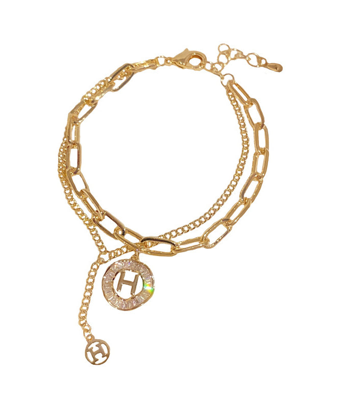 Gold Alloy Crystal Graphic Tassel Charm Bracelet
