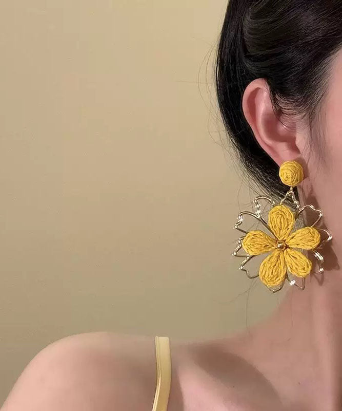 Stylish Yellow Alloy Weavin Hollow Out Drop Earrings