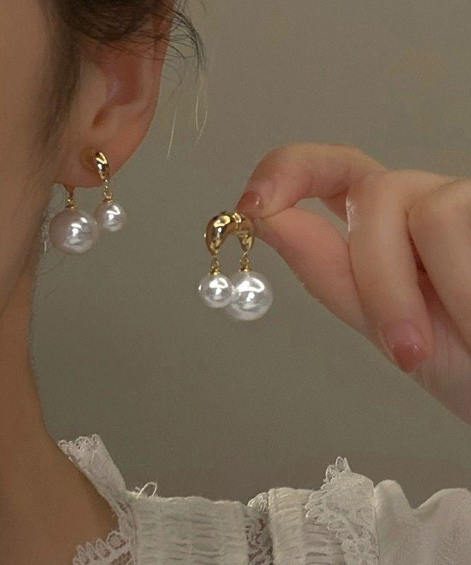 Brief Gold Copper Alloy Pearl Stud Earrings