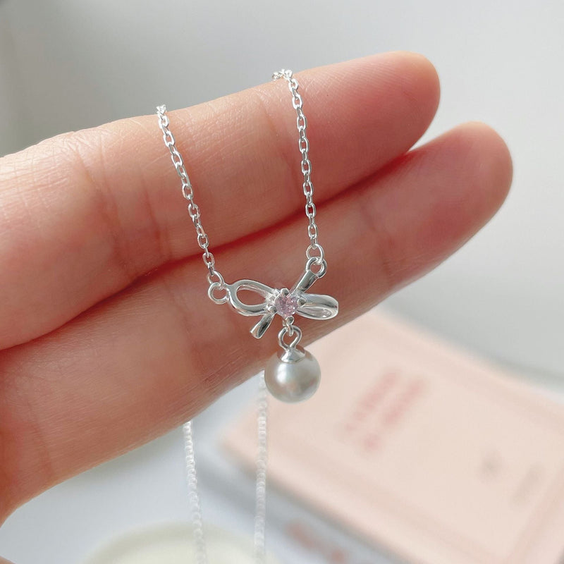 Cady Bow and Pearl Necklace