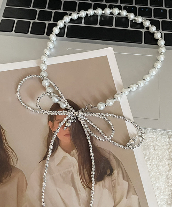 Art Silk Stainless Steel Pearl Bow Tie Lac Pendant Necklace Ya017