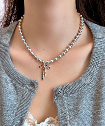 Fine Silk Stainless Steel Pearl Bow Pendant Necklace Wq029