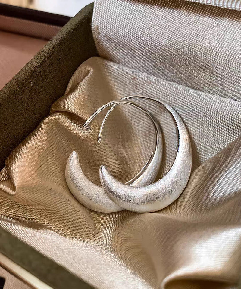 Modern Silk Sterling Silver Crescent Moon Hoop Earrings