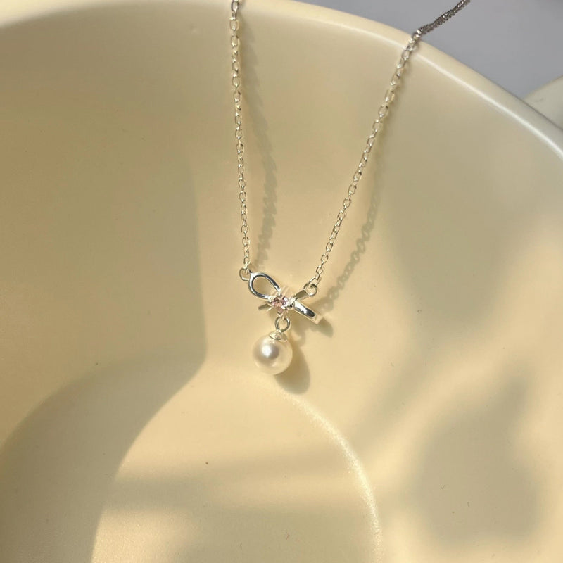 Cady Bow and Pearl Necklace