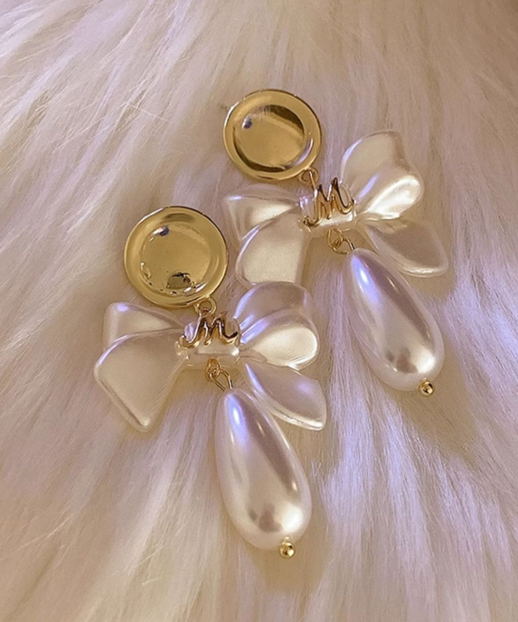 White Copper Alloy Pearl Bow Drop Earrings