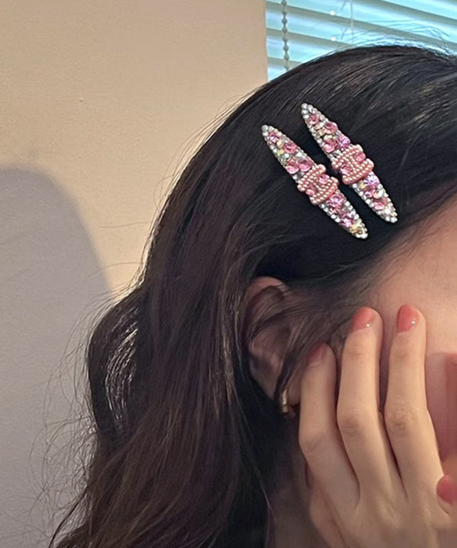 Pink Metal Zircon Pearl Graphic Hairpin