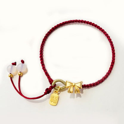 Red String Bracelet With Fu Character Charm and Peach Blossom Detail